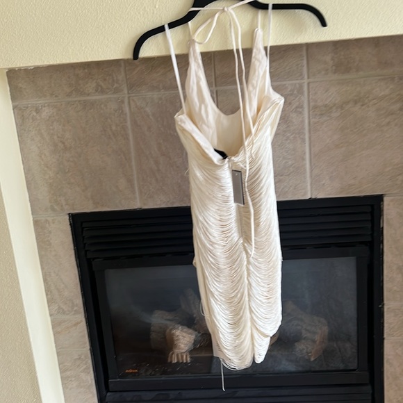 x REVOLVE Skylar Mini Dress in Ivory
Michael Costello - Picture 8 of 8